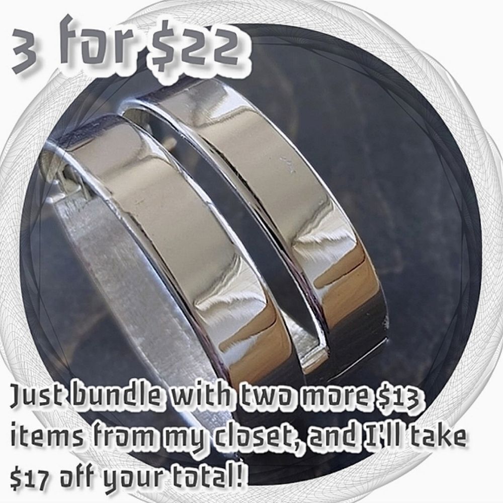 Silver tone wide cutout hinged cuff